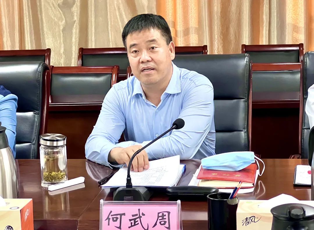 何武周与中国银行洛阳分行行长李鸿运举行工作会谈